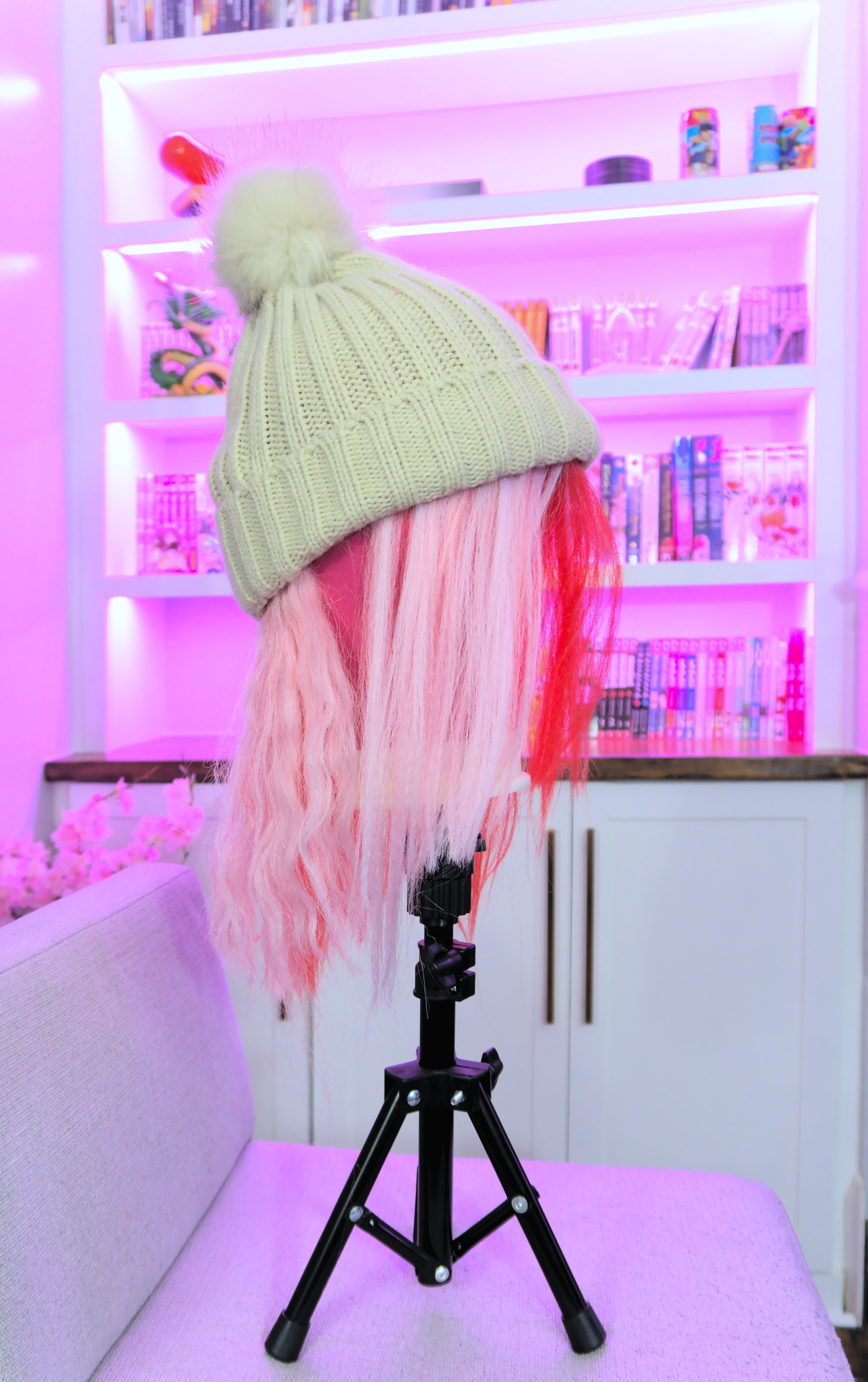 Side profile of Kiobito Hat Wig. Pink side is showing