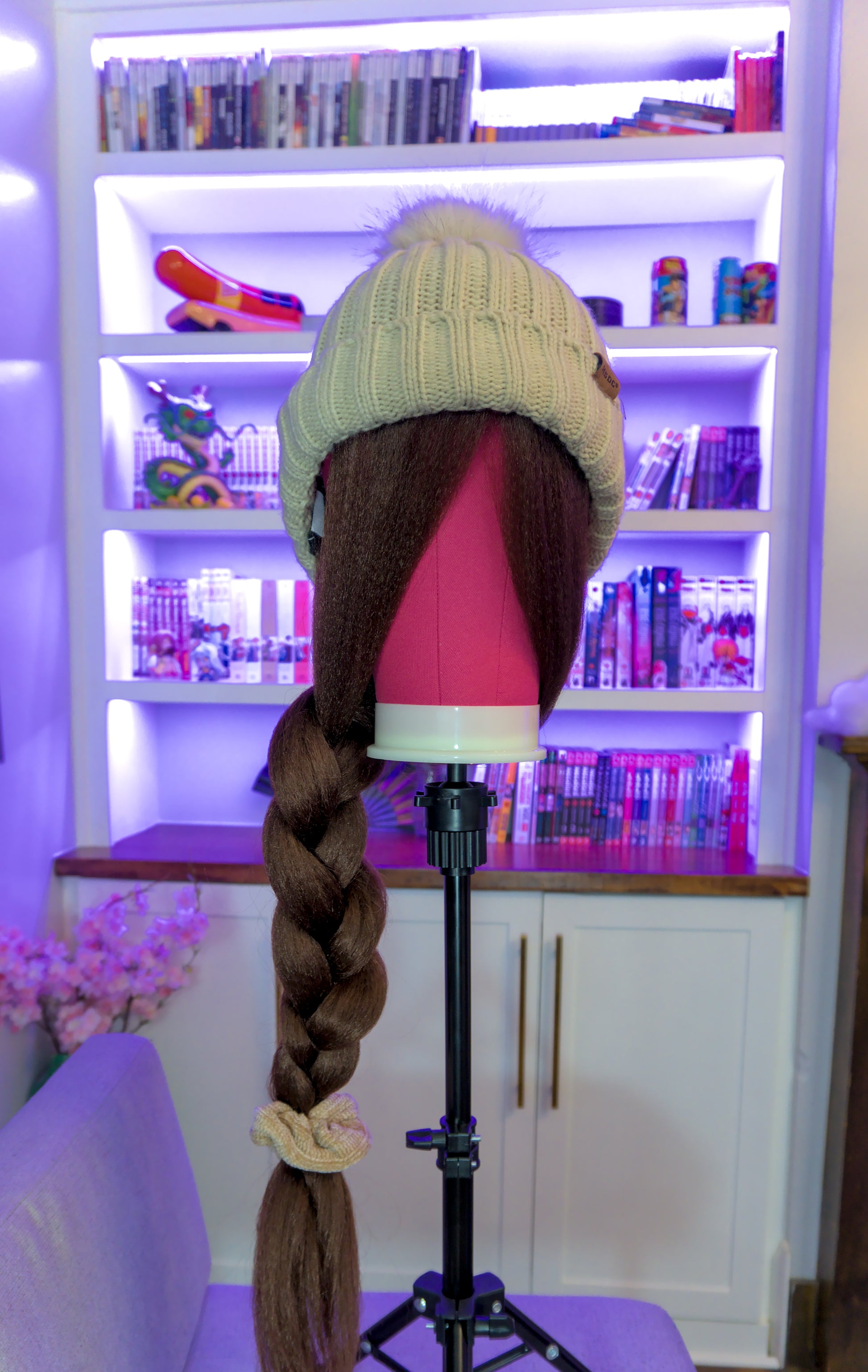Long Medium Brown wig hat with Oatmeal Beanie . The hair has an over the shoulder braid in it