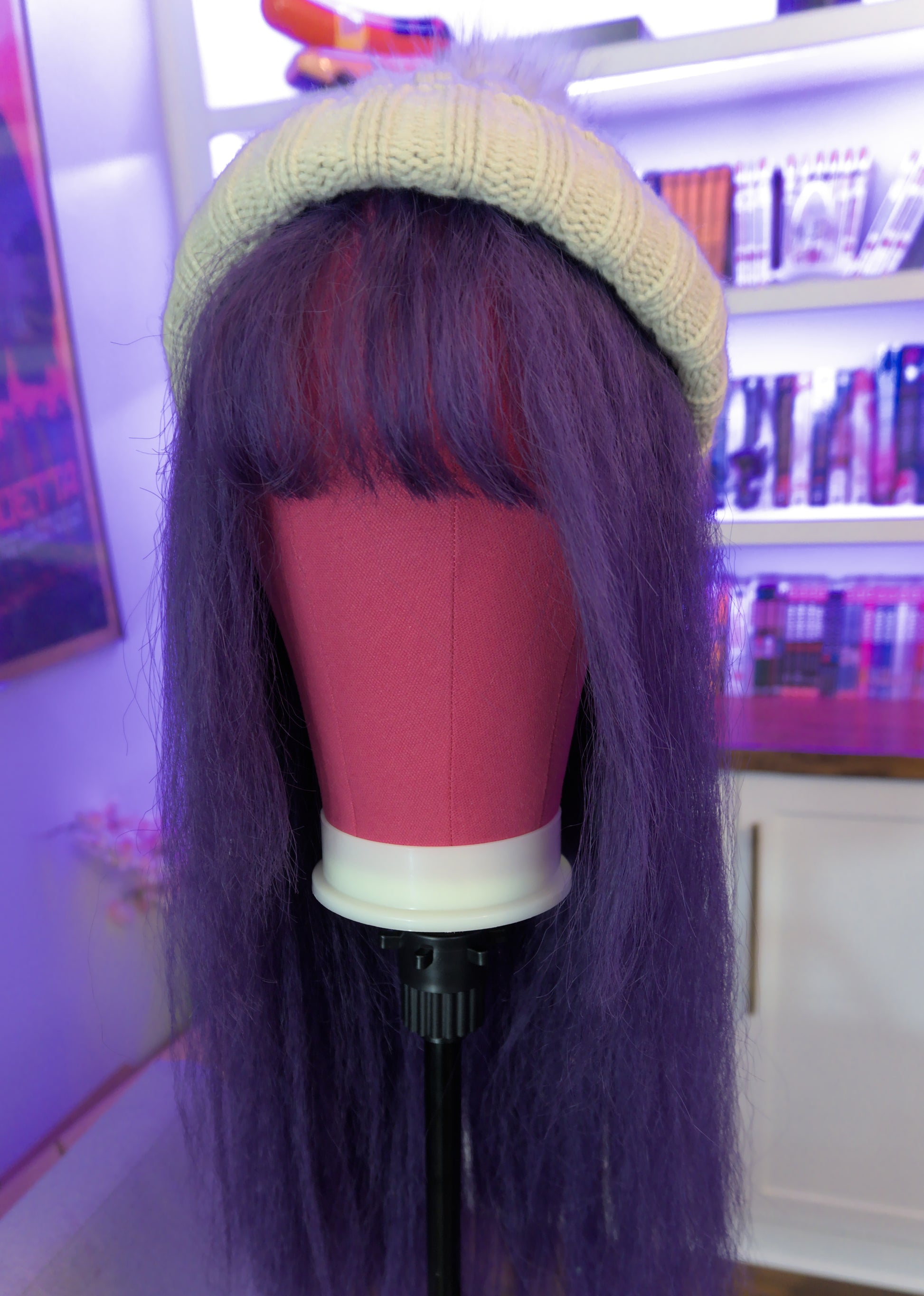 closeup of straight bang on purple craze wig